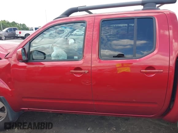 ✅ 2012 Nissan Frontier Pro-4X • VIN: 1N6AD0EV3CC439870 • Lot: 42269470. Listed on IAAI with 165,597 mi. Free auction sales archive from the USA and detailed vehicle history report at DreamBid. Image 14.