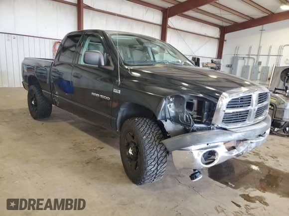 2006 Dodge 1500 Laramie z VIN 1D7HU18216S646119, wystawiony jako Copart lot #69236755 z przebiegiem 276 183 mil mil oraz Szkoda całkowita • Salvage title. Historia ofert i sprzedaży dostępna na DreamBid. Obrazek 4.