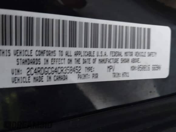 2016 Dodge Grand Caravan American Value z VIN 2C4RDGBG9GR101617, wystawiony jako IAAI lot #43558150 z przebiegiem 252 772 mil mil oraz . Historia ofert i sprzedaży dostępna na DreamBid. Obrazek 9.