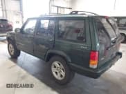 ✅ 2001 Jeep Cherokee Sport • VIN: 1J4FF58S51L579766 • Lot: 42623211. Listed on IAAI with 257,681 mi. Free auction sales archive from the USA and detailed vehicle history report at DreamBid. Image 3.