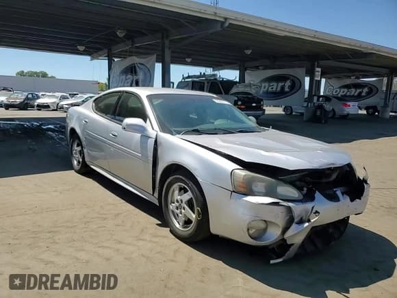 ✅ 2004 Pontiac Grand Prix GT1 • VIN: 2G2WP522741197040 • Лот: 68385175. Опубликован ранее на Copart с пробегом 288 541 миль. Бесплатный доступ к архиву аукционных продаж из США и подробный отчёт об истории автомобиля на DreamBid. Изображение 13.