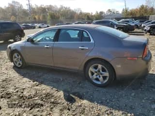 ✅ 2010 Chevrolet Malibu 1LT • VIN: 1G1ZC5E02AF243983 • Lot: 37243384. Listed on Copart with 157,502 mi. Free auction sales archive from the USA and detailed vehicle history report at DreamBid. Image 2.