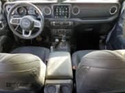 ✅ 2023 Jeep Wrangler Sahara • VIN: 1C4JJXP60PW689291 • Lot: 81000384. Listed on Copart with 9,028 mi. Free auction sales archive from the USA and detailed vehicle history report at DreamBid. Image 8.