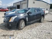 ✅ 2014 Cadillac SRX Performance Collection • VIN: 3GYFNFE32ES571405 • Lot: 68138685. Listed on Copart with 145,819 mi. Free auction sales archive from the USA and detailed vehicle history report at DreamBid. Image 1.