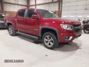 ✅ 2018 Chevrolet Colorado 4WD Z71 • VIN: 1GCGTDEN4J1185490 • Лот: 43420567. Опубликован ранее на IAAI с пробегом 80 532 миль. Бесплатный доступ к архиву аукционных продаж из США и подробный отчёт об истории автомобиля на DreamBid. Изображение 1.