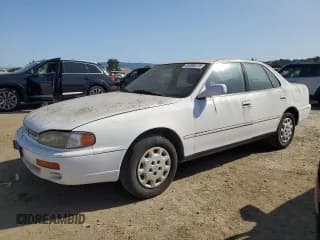 ✅ 1995 Toyota Camry LE • VIN: JT2SK12E9S0288565 • Лот: 61309275. Опубликован ранее на Copart с пробегом 182 952 миль. Бесплатный доступ к архиву аукционных продаж из США и подробный отчёт об истории автомобиля на DreamBid. Изображение 1.