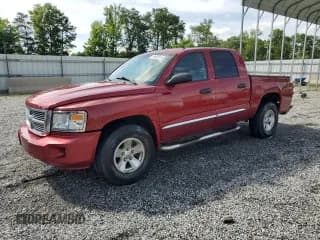 ✅ 2008 Dodge Dakota Laramie • VIN: 1D7HW58N28S602631 • Lot: 61009915. Wystawiony na Copart z przebiegiem 164 260 mil. Bezpłatny archiwum sprzedaży aukcyjnych z USA i szczegółowy raport historii pojazdu na DreamBid. Zdjęcie 1.