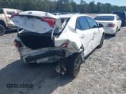 ✅ 2018 Toyota Corolla SE • VIN: 5YFBURHEXJP833667 • Lot: 43355639. Listed on IAAI with 116,952 mi. Free auction sales archive from the USA and detailed vehicle history report at DreamBid. Image 4.