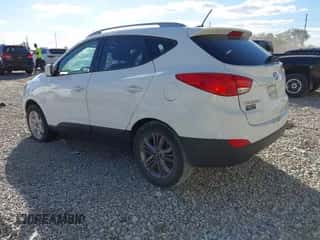 2014 Hyundai Tucson Limited with VIN KM8JU3AG6EU791944, listed as a IAAI auction lot 43436689 with 167,083 mi miles and . Bid and sale history available at DreamBid. Image 3.