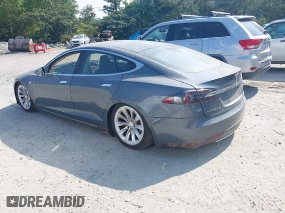 ✅ 2013 Tesla Model S Performance • VIN: 5YJSA1DPXDFP06497 • Lot: 43005300. Listed on IAAI with 33,940 mi. Free auction sales archive from the USA and detailed vehicle history report at DreamBid. Image 3.