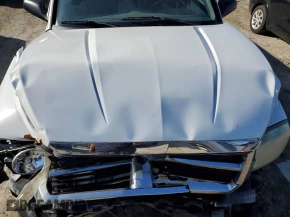 2007 Dodge Dakota ST z VIN 1D7HW22K57S216328, wystawiony jako Copart lot #47400585 z przebiegiem Nie podano mil oraz Szkoda całkowita • Salvage title. Historia ofert i sprzedaży dostępna na DreamBid. Obrazek 11.