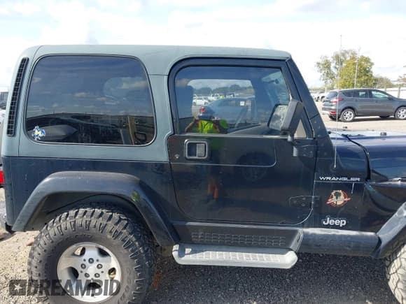 ✅ 2002 Jeep Wrangler Sahara • VIN: 1J4FA59S62P756767 • Lot: 43730556. Listed on IAAI with 145,681 mi. Free auction sales archive from the USA and detailed vehicle history report at DreamBid. Image 14.