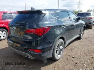 2017 Hyundai Santa Fe 2.4L z VIN 5NMZT3LB9HH009868, wystawiony jako IAAI lot #43376479 z przebiegiem 126 203 mil mil oraz . Historia ofert i sprzedaży dostępna na DreamBid. Obrazek 4.