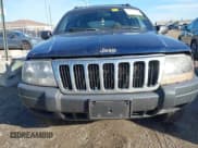 ✅ 2001 Jeep Grand Cherokee Laredo • VIN: 1J4GW48S01C699585 • Lot: 43744180. Listed on IAAI with 219,402 mi. Free auction sales archive from the USA and detailed vehicle history report at DreamBid. Image 12.