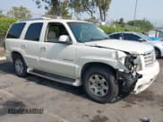 ✅ 2003 Cadillac Escalade • VIN: 1GYEC63T33R300888 • Lot: 42888898. Listed on IAAI with 264,605 mi. Free auction sales archive from the USA and detailed vehicle history report at DreamBid. Image 1.
