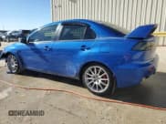 ✅ 2015 Mitsubishi Lancer Evolution GSR • VIN: JA32W8FV6FU006930 • Lot: 84628474. Listed on Copart with 116,819 mi. Free auction sales archive from the USA and detailed vehicle history report at DreamBid. Image 2.