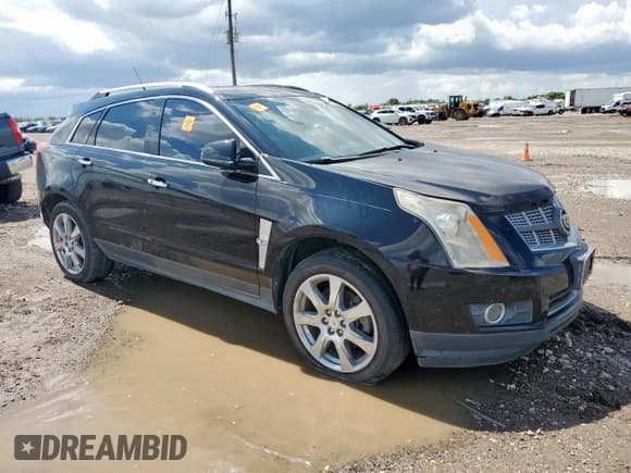 ✅ 2012 Cadillac SRX Premium Collection • VIN: 3GYFNCE39CS504375 • Лот: 89707115. Опубликован ранее на Copart с пробегом Не указан. Бесплатный доступ к архиву аукционных продаж из США и подробный отчёт об истории автомобиля на DreamBid. Изображение 4.