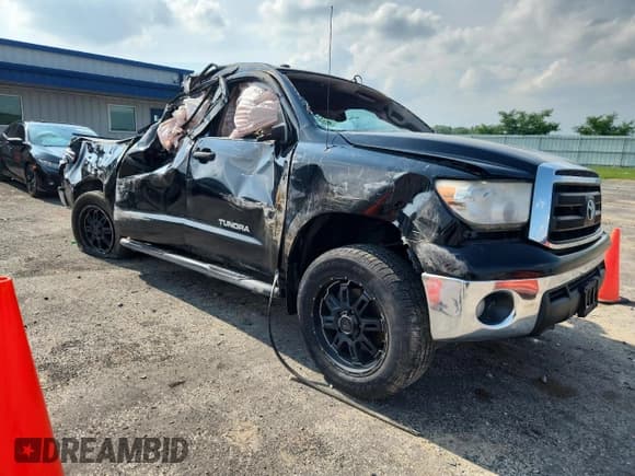 ✅ 2013 Toyota Tundra • VIN: 5TFEM5F15DX065933 • Lot: 63824115. Listed on Copart with 219,693 mi. Free auction sales archive from the USA and detailed vehicle history report at DreamBid. Image 4.
