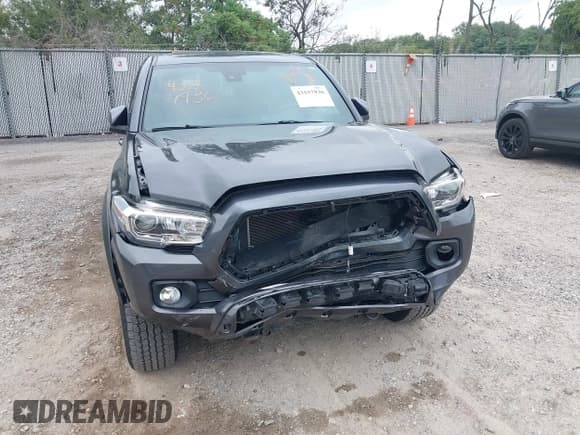 ✅ 2021 Toyota Tacoma SR5 • VIN: 3TMDZ5BN2MM100889 • Лот: 43157936. Опубликован ранее на IAAI с пробегом 36 630 миль. Бесплатный доступ к архиву аукционных продаж из США и подробный отчёт об истории автомобиля на DreamBid. Изображение 17.