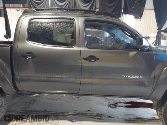 ✅ 2015 Toyota Tacoma • VIN: 3TMLU4EN9FM164933 • Lot: 41447209. Listed on IAAI with 248,613 mi. Free auction sales archive from the USA and detailed vehicle history report at DreamBid. Image 13.