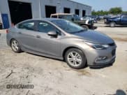 ✅ 2017 Chevrolet Cruze LT • VIN: 1G1BE5SM5H7280260 • Lot: 60887773. Listed on Copart with 77,048 mi. Free auction sales archive from the USA and detailed vehicle history report at DreamBid. Image 4.