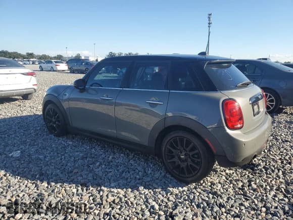 ✅ 2018 MINI Hardtop 4 Door Cooper • VIN: WMWXU1C58J2F79549 • Lot: 89432875. Listed on Copart with 70,722 mi. Free auction sales archive from the USA and detailed vehicle history report at DreamBid. Image 2.