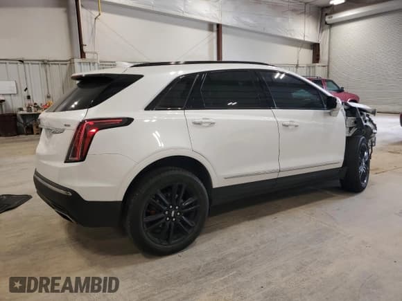 ✅ 2023 Cadillac XT5 AWD Sport • VIN: 1GYKNGRS9PZ166766 • Lot: 59189025. Listed on Copart with 36,110 mi. Free auction sales archive from the USA and detailed vehicle history report at DreamBid. Image 3.