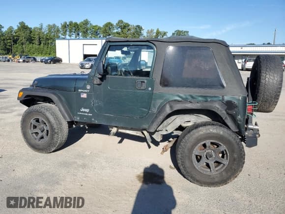 ✅ 2004 Jeep Wrangler Sport • VIN: 1J4FA49S14P735502 • Lot: 70548875. Listed on Copart with Not provided. Free auction sales archive from the USA and detailed vehicle history report at DreamBid. Image 2.