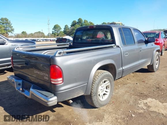 ✅ 2003 Dodge Dakota SLT • VIN: 1D7HL48X03S174569 • Lot: 41159169. Wystawiony na IAAI z przebiegiem 156 551 mil. Bezpłatny archiwum sprzedaży aukcyjnych z USA i szczegółowy raport historii pojazdu na DreamBid. Zdjęcie 4.