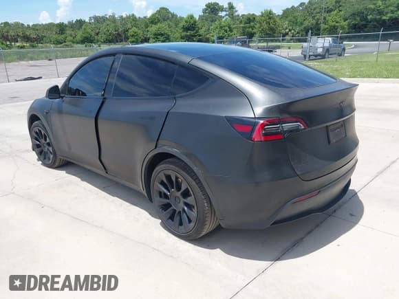 ✅ 2021 Tesla Model Y Standard Range • VIN: 5YJYGDED7MF103893 • Lot: 42892555. Listed on IAAI with 102,946 mi. Free auction sales archive from the USA and detailed vehicle history report at DreamBid. Image 3.