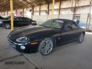 ✅ 2005 Jaguar XK XK8 • VIN: SAJDA42C852A41568 • Lot: 62331245. Listed on Copart with 145,057 mi. Free auction sales archive from the USA and detailed vehicle history report at DreamBid. Image 1.