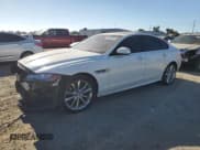 ✅ 2016 Jaguar XF 35t R-Sport • VIN: SAJBF4BV7GCY15961 • Lot: 66700485. Listed on Copart with 77,983 mi. Free auction sales archive from the USA and detailed vehicle history report at DreamBid. Image 1.