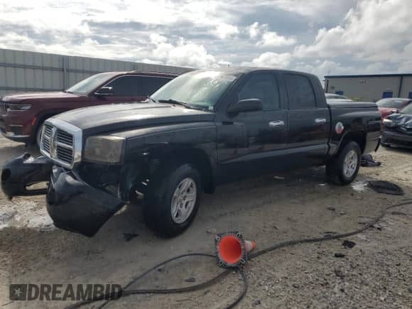 2006 Dodge Dakota SLT z VIN 1D7HE48NX6S539725, wystawiony jako Copart lot #72947004 z przebiegiem 199 562 mil mil oraz Szkoda całkowita • Salvage title. Historia ofert i sprzedaży dostępna na DreamBid. Obrazek 1.