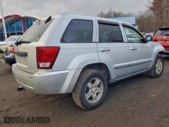 ✅ 2007 Jeep Grand Cherokee Laredo • VIN: 1J8GR48K57C680366 • Lot: 91574885. Listed on Copart with 166,498 mi. Free auction sales archive from the USA and detailed vehicle history report at DreamBid. Image 3.
