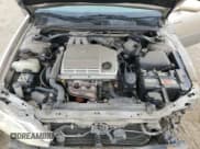 ✅ 1999 Lexus ES 300 • VIN: JT8BF28G8X5059085 • Lot: 71714964. Wystawiony na Copart z przebiegiem 193 745 mil. Bezpłatny archiwum sprzedaży aukcyjnych z USA i szczegółowy raport historii pojazdu na DreamBid. Zdjęcie 11.