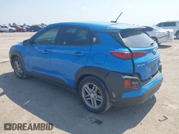 ✅ 2019 Hyundai Kona SE • VIN: KM8K12AA0KU268210 • Лот: 43262556. Опубликован ранее на IAAI с пробегом 86 696 миль. Бесплатный доступ к архиву аукционных продаж из США и подробный отчёт об истории автомобиля на DreamBid. Изображение 3.
