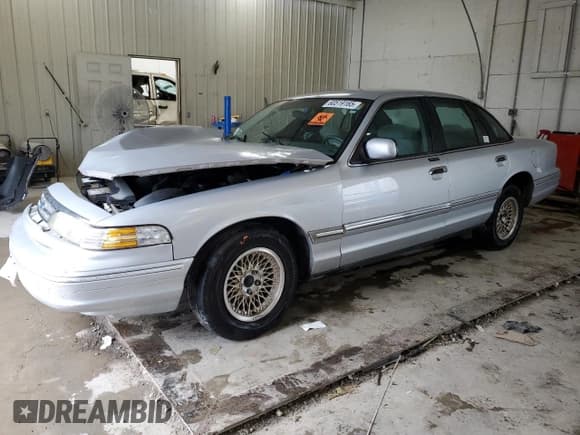 ✅ 1996 Ford Crown Victoria LX • VIN: 2FALP74W7TX205701 • Lot: 60519165. Listed on Copart with 183,546 mi. Free auction sales archive from the USA and detailed vehicle history report at DreamBid. Image 1.