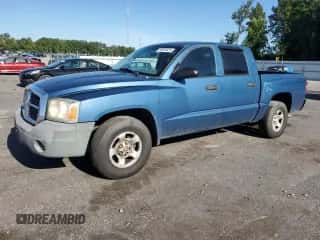 2005 Dodge Dakota ST с VIN 1D7HE28KX5S204098, выставлен на аукционе Copart как лот 69924624 с пробегом 326 213 миль миль и Списание • Salvage title. История ставок и продаж доступна на DreamBid. Изображение 1.