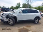 ✅ 2014 Jeep Cherokee Altitude • VIN: 1C4PJMCS2EW128356 • Lot: 42513328. Listed on IAAI with 89,884 mi. Free auction sales archive from the USA and detailed vehicle history report at DreamBid. Image 15.