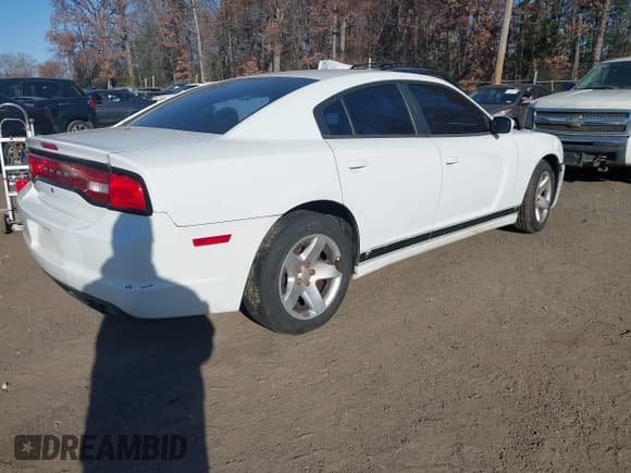 ✅ 2014 Dodge Charger Police • VIN: 2C3CDXAT2EH350711 • Lot: 43688159. Listed on IAAI with 128,318 mi. Free auction sales archive from the USA and detailed vehicle history report at DreamBid. Image 4.