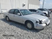 ✅ 2000 Ford Crown Victoria • VIN: 2FAFP73W9YX125743 • Lot: 57642895. Wystawiony na Copart z przebiegiem 324 384 mil. Bezpłatny archiwum sprzedaży aukcyjnych z USA i szczegółowy raport historii pojazdu na DreamBid. Zdjęcie 4.