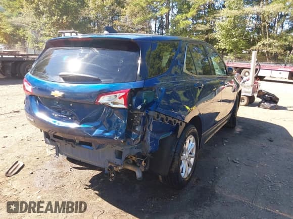 ✅ 2020 Chevrolet Equinox LT • VIN: 2GNAXJEV5L6153020 • Lot: 43486682. Listed on IAAI with 66,378 mi. Free auction sales archive from the USA and detailed vehicle history report at DreamBid. Image 4.