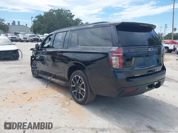 ✅ 2024 Chevrolet Suburban • VIN: 1GNSCEKT8RR350187 • Lot: 43045718. Listed on IAAI with 28,587 mi. Free auction sales archive from the USA and detailed vehicle history report at DreamBid. Image 3.