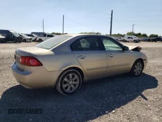 ✅ 2006 Kia Optima LX • VIN: KNAGE123365027358 • Лот: 73384984. Опубликован ранее на Copart с пробегом 228 176 миль. Бесплатный доступ к архиву аукционных продаж из США и подробный отчёт об истории автомобиля на DreamBid. Изображение 3.