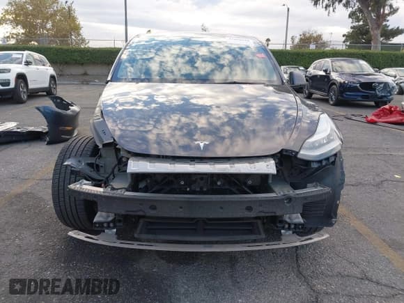 ✅ 2021 Tesla Model Y Long Range • VIN: 5YJYGAEE8MF192669 • Lot: 43698628. Listed on IAAI with 136,952 mi. Free auction sales archive from the USA and detailed vehicle history report at DreamBid. Image 13.