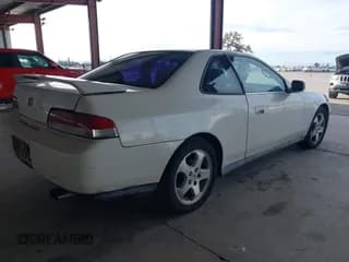 ✅ 1999 Honda Prelude • VIN: JHMBB6247XC003233 • Лот: 41670726. Опубликован ранее на IAAI с пробегом 185 021 миль. Бесплатный доступ к архиву аукционных продаж из США и подробный отчёт об истории автомобиля на DreamBid. Изображение 4.