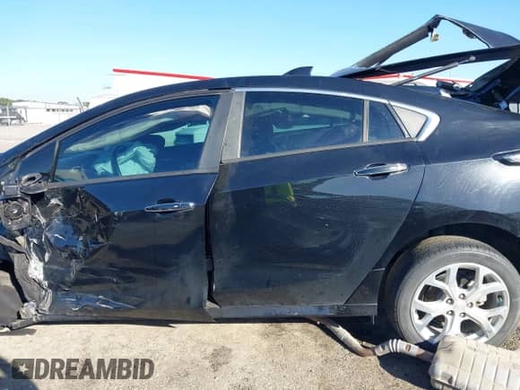 2017 Chevrolet Volt Premier z VIN 1G1RB6S5XHU203648, wystawiony jako IAAI lot #43468353 z przebiegiem Nie podano mil oraz . Historia ofert i sprzedaży dostępna na DreamBid. Obrazek 14.