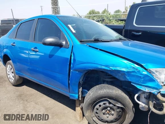 ✅ 2007 Ford Focus S • VIN: 1FAHP34N57W157378 • Lot: 43121550. Listed on IAAI with 76,057 mi. Free auction sales archive from the USA and detailed vehicle history report at DreamBid. Image 14.