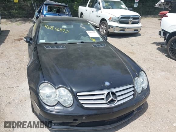 ✅ 2005 Mercedes-Benz SL 55 AMG • VIN: WDBSK74F85F101039 • Lot: 42812397. Listed on IAAI with 76,452 mi. Free auction sales archive from the USA and detailed vehicle history report at DreamBid. Image 6.