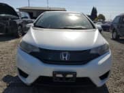✅ 2016 Honda Fit LX • VIN: JHMGK5H59GX009883 • Lot: 81238545. Listed on Copart with 96,970 mi. Free auction sales archive from the USA and detailed vehicle history report at DreamBid. Image 5.